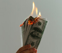 image of burning money