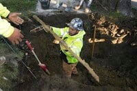 FILE - A cut lead pipe is pulled from a dig site for testing at a home in Royal Oak, Mich., on Nov. 16, 2021. (AP Photo/Carlos Osorio, File)