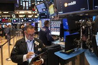 Traders work on the floor of the New York Stock Exchange, Friday, Aug. 1, 2025, in New York. (AP Photo/Yuki Iwamura)