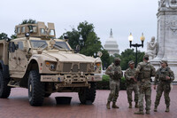 Members of the District of Columbia National Guard patrol outside Union Station, Tuesday, Aug. 19, 2025, in Washington. (AP Photo/Jose Luis Magana)