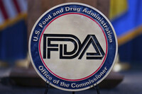 FILE - The Food and Drug Administration seal is seen at the Hubert Humphrey Building Auditorium in Washington, April 22, 2025. (AP Photo/Jose Luis Magana, File)