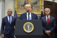 President Donald Trump speaks in the Roosevelt Room of the White House, Monday, Sept. 22, 2025, in Washington, as Health and Human Services Secretary Robert F. Kennedy Jr., left, and Centers for Medicare &amp; Medicaid Services administrator Dr. Mehmet Oz listen. (AP Photo/Mark Schiefelbein)