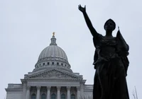The Wisconsin State Capitol and the Forward statue. Photo by Ben Donahue.