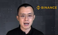 FILE - Binance CEO Changpeng Zhao answers a question during a Zoom meeting interview with The Associated Press on Nov. 16, 2021.