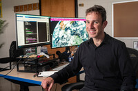 University of Wisconsin-Madison professor Ángel F. Adames Corraliza sits for a portrait in his office at the Department of Atmospheric and Oceanic Sciences in Madison, Wis., Monday, Oct. 6, 2025. (AP Photo/Andy Manis)