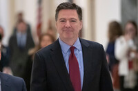 FILE - Former FBI Director James Comey, arrivex to testify under subpoena behind closed doors before the House Judiciary and Oversight Committee on Capitol Hill in Washington, Dec. 7, 2018. (AP Photo/J. Scott Applewhite, File)