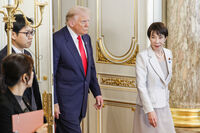 U.S. President Donald Trump, center, and Japan's Prime Minister Sanae Takaichi, right, arrive for the Japan-US summit meeting at Akasaka Palace State Guest House in Tokyo, Japan, Tuesday, Oct. 28, 2025. (Franck Robichon/Pool Photo via AP)