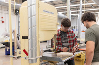 UW-Stout students work with a bandsaw in the newly renovated Woods Lab inside the Jarvis Hall Technology Wing.