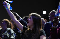 People cheer during an election night watch party for Virginia Democratic gubernatorial candidate Abigail Spanberger, Tuesday, Nov. 4, 2025, in Richmond, Va. (AP Photo/Stephanie Scarbrough)