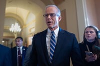 Speaking to reporters, Senate Majority Leader John Thune, R-S.D., responds to Senate Democratic Leader Chuck Schumer to reopen the government if Republicans extend expiring health care subsidies for one year, at the Capitol in Washington, Friday, Nov. 7, 2025, day 38 of the government shutdown. (AP Photo/J. Scott Applewhite)