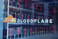 FILE - Lava lamps are seen through a lobby window at the headquarters of Cloudflare in San Francisco, Wednesday, Aug. 31, 2022. (AP Photo/Eric Risberg, File)