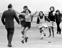 FILE - Released prisoner of war Lt. Col. Robert L. Stirm is greeted by his family at Travis Air Force Base in Fairfield, Calif., as he returns home from the Vietnam War, March 17, 1973. (AP Photo/Sal Veder, File)