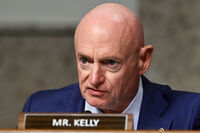 FILE - Sen. Mark Kelly, D-Ariz., speaks during a Senate Intelligence Committee hearing, at the Capitol in Washington, Jan. 15, 2025. (AP Photo/John McDonnell, File)