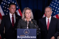 FILE - Rep. Jen Kiggans, R-Va., center, accompanied by Rep. Zachary Nunn, R-Iowa, left, and House Majority Leader Steve Scalise, R-La., right, speaks at a news conference at the Republican National Committee headquarters on Capitol Hill, in Washington, Wednesday, Sept. 18, 2024. (AP Photo/Ben Curtis, File)