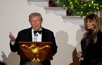President Donald Trump and first lady Melania greet guests in the Grand Foyer of the White House during the Congressional Ball, Thursday, Dec. 11, 2025, in Washington. (AP Photo/Alex Brandon)