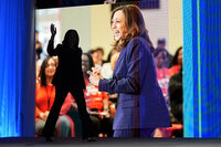 Vice President Kamala Harris, walking left, waves as she arrives to speak during the American Federation of Teachers' 88th national convention, Thursday, July 25, 2024, in Houston. (AP Photo/Tony Gutierrez)