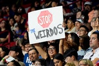 A supporter carries a sign before Democratic presidential nominee Vice President Kamala Harris speaks at a campaign rally, Saturday, Aug. 10, 2024, in Las Vegas. (AP Photo/Julia Nikhinson)