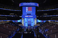 Workers prepare the convention floor at United Center before the Democratic National Convention Sunday, Aug. 18, 2024, in Chicago. (AP Photo/Paul Sancya)