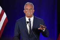 Independent presidential candidate Robert F. Kennedy Jr. announces he is suspending his presidential campaign at a news conference Friday, Aug 23, 2024, in Phoenix. (AP Photo/Darryl Webb)