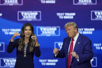 Republican presidential nominee former President Donald Trump and South Dakota Gov. Kristi Noem dance to the song &quot;Y.M.C.A.&quot; at a campaign town hall at the Greater Philadelphia Expo Center &amp; Fairgrounds, Monday, Oct. 14, 2024, in Oaks, Pa. (AP Photo/Matt Rourke)