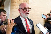 FILE - Rep. Derrick Van Orden, D-Wis., speaks with reporters as he arrives for the Republican caucus meeting at the Capitol in Washington, Oct. 19, 2023. (AP Photo/Alex Brandon, File)