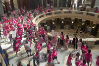 FILE - Abortion rights supporters gather for a &quot;pink out&quot; protest organized by Planned Parenthood in the rotunda of the Wisconsin Capitol, June 22, 2022, in Madison, Wis. (AP Photo/Harm Venhuizen, File)