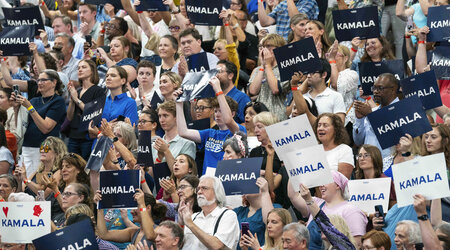 Supports hold up signs in support of Vice President Kamala Harris as she campaigns for President as the presumptive Democratic candidate during an event at West Allis Central High School on Tuesday, July 23, 2024, in West Allis, Wis. (AP Photo/Kayla Wolf)