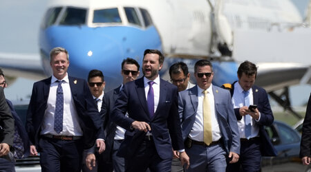 Republican vice presidential nominee Sen. JD Vance, R-Ohio, walks back from looking at Air Force Two at Chippewa Valley Regional Airport, Wednesday, Aug. 7, 2024, in Eau Claire, Wis. (AP Photo/Alex Brandon)