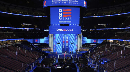 Workers prepare the convention floor at United Center before the Democratic National Convention Sunday, Aug. 18, 2024, in Chicago. (AP Photo/Paul Sancya)