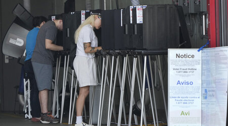 FILE - Voters cast their ballots in Florida's primary election, Tuesday, Aug. 20, 2024, at a polling place inside the Indian Creek Fire Station in Miami Beach, Fla. (AP Photo/Wilfredo Lee, File)