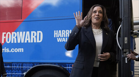 Democratic presidential nominee Vice President Kamala Harris waves as she exits her campaign bus in Savannah, Ga., Wednesday, Aug. 28, 2024. (AP Photo/Jacquelyn Martin)