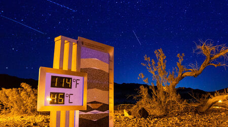 FILE - A long exposure image shows the recorded temperature on a thermostat at the Furnace Creek Visitors Center, after 10:00 p.m. July 7, 2024, in Death Valley National Park, Calif. (AP Photo/Ty ONeil, File)