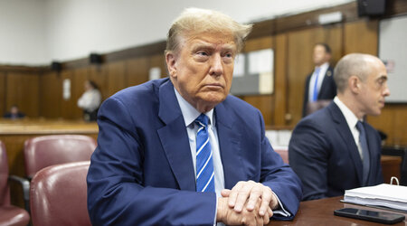 FILE - Former President Donald Trump awaits the start of proceedings on the second day of jury selection at Manhattan criminal court, April 16, 2024, in New York. Manhattan prosecutors are balking at Donald Trump efforts to delay post-trial decisions in his New York hush money criminal case as he seeks to have a federal court intervene and potentially overturn his felony conviction. They lodged their objections in a letter Tuesday to the trial judge but said they could be OK with postponing the ex-president