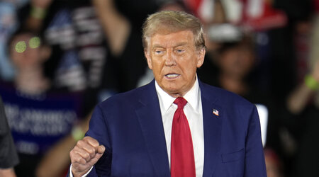 Republican presidential nominee former President Donald Trump arrives for a town hall event at Macomb Community College Friday, Sept. 27, 2024, in Warren, Mich. (AP Photo/Paul Sancya)