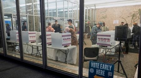 Voters cast their ballots at the Frank P. Zeidler Municipal Building during the first day of Wisconsin's in-person absentee voting Tuesday, Oct. 22, 2024, in Milwaukee. (AP Photo/Morry Gash)