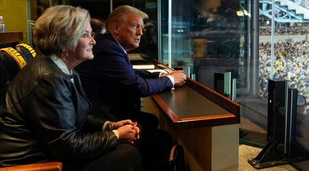 Republican presidential nominee former President Donald Trump sits with Susie Wiles as he attends the New York Jets football game against the Pittsburgh Steelers at Acrisure Stadium, Sunday, Oct. 20, 2024, in Pittsburgh. (AP Photo/Evan Vucci, Pool)