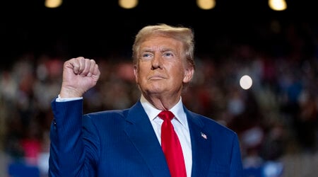 Republican presidential nominee former President Donald Trump pumps his fist as he arrives to speak at a campaign event at Nassau Coliseum, Wednesday, Sept.18, 2024, in Uniondale, N.Y. (AP Photo/Alex Brandon)