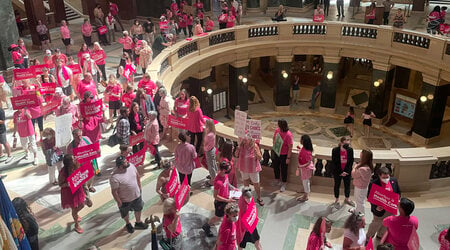 FILE - Abortion rights supporters gather for a &quot;pink out&quot; protest organized by Planned Parenthood in the rotunda of the Wisconsin Capitol, June 22, 2022, in Madison, Wis. (AP Photo/Harm Venhuizen, File)