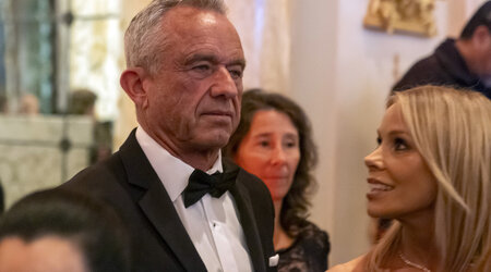 Robert F. Kennedy Jr., and his wife Cheryl Hines arrive before President-elect Donald Trump speaks during an America First Policy Institute gala at his Mar-a-Lago estate, Thursday, Nov. 14, 2024, in Palm Beach, Fla. (AP Photo/Alex Brandon)