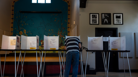 A voter casts a ballot during the primary election Aug. 13, 2024, at the Wil-Mar Neighborhood Center in Madison, Wis. (Joe Timmerman / Wisconsin Watch)