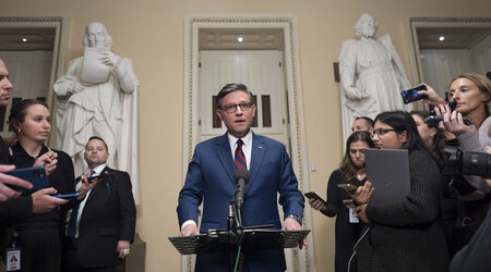 Speaker of the House Mike Johnson, R-La., talks briefly to reporters just before a vote on an interim spending bill to prevent a government shutdown, at the Capitol in Washington, Thursday, Dec. 19, 2024. The vote failed to pass. (AP Photo/J. Scott Applewhite)