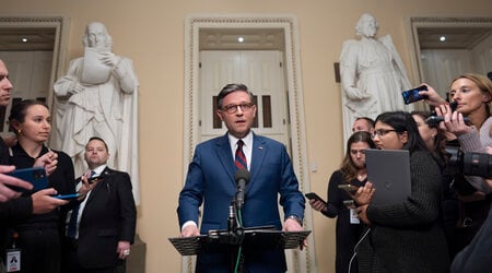 Speaker of the House Mike Johnson, R-La., talks briefly to reporters just before a vote on an interim spending bill to prevent a government shutdown, at the Capitol in Washington, Thursday, Dec. 19, 2024. The vote failed to pass. (AP Photo/J. Scott Applewhite)