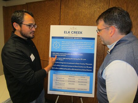 Robert Shanklin, right, president and CEO of TED Renewables and Dylan Stickney, project developer for Elk Creek Solar, were at the open house to answer questions from the community at the Spring Brook town hall.