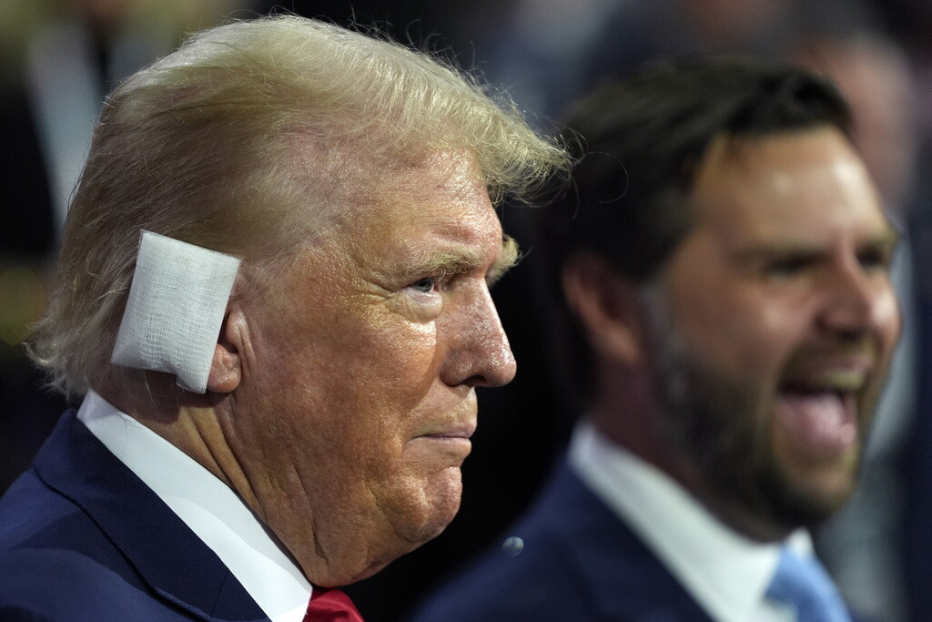 Republican presidential candidate former President Donald Trump and Republican vice presidential candidate Sen. JD Vance, R-Ohio, attend the first day of the Republican National Convention, Monday, July 15, 2024, in Milwaukee. (AP Photo/Evan Vucci)