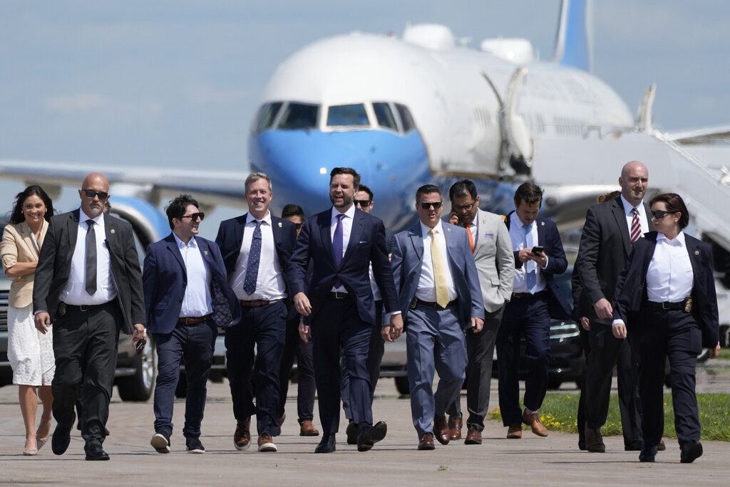 Republican vice presidential nominee Sen. JD Vance, R-Ohio, walks back from looking at Air Force Two at Chippewa Valley Regional Airport, Wednesday, Aug. 7, 2024, in Eau Claire, Wis. (AP Photo/Alex Brandon)