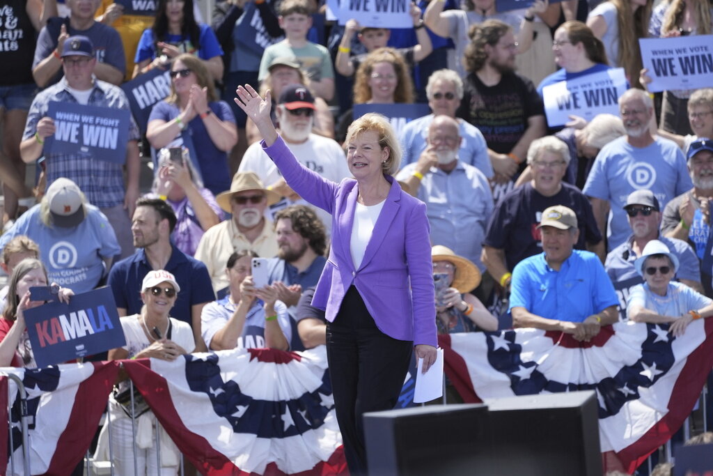 Sen. Tammy Baldwin, D-Wisc., waves to the crowd before Democratic presidential nominee Vice President Kamala Harris, delivers remarks at a campaign event, Wednesday, Aug. 7, 2024, in Eau Claire, Wisc. (AP Photo/Charles Rex Arbogast)