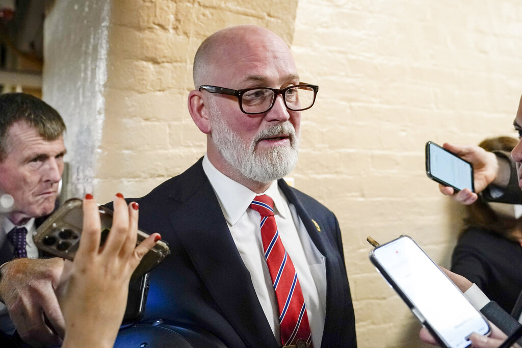 FILE - Rep. Derrick Van Orden, D-Wis., speaks with reporters as he arrives for the Republican caucus meeting at the Capitol in Washington, Oct. 19, 2023. (AP Photo/Alex Brandon, File)