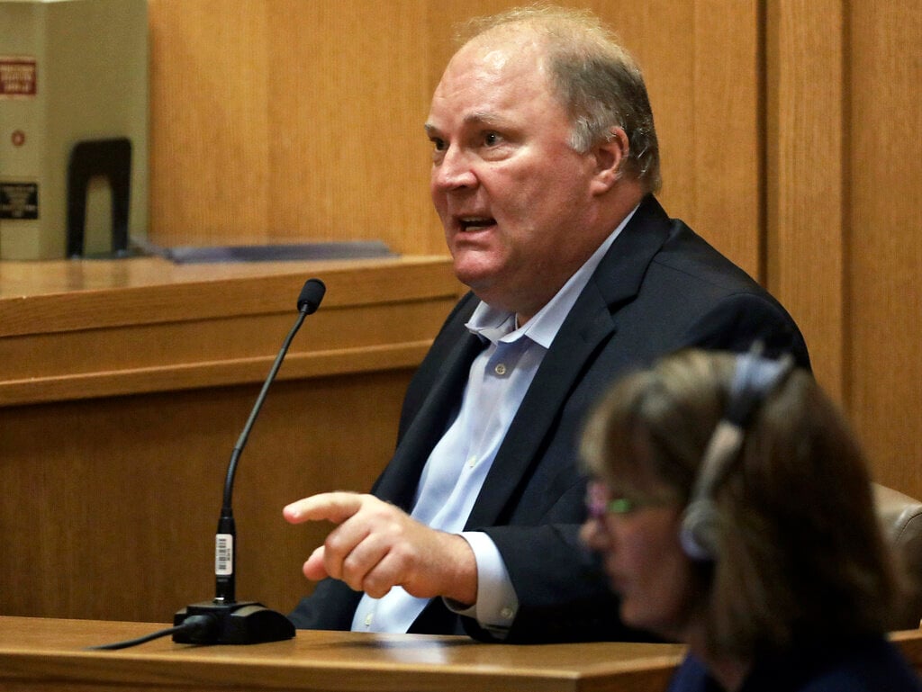 FILE - Former Wisconsin Supreme Court Justice Michael Gableman, an investigator hired by Republicans to look into former President Donald Trump's 2020 loss in the battleground state, takes the stand and refuses to answer questions from Circuit Court Judge Frank Remington, June 10, 2022, in Madison, Wis. (Amber Arnold/Wisconsin State Journal via AP, File)