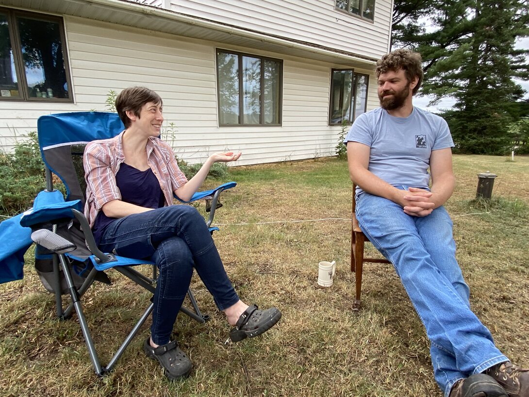 Lauren and Caleb Langworthy discuss their struggles because of poor internet service at their home north of Wheeler in Dunn County. The couple relies on website updates and social media for direct sales of products from their Blue Ox Farm, but doing so is challenging with slow internet speeds. (Photo by Julian Emerson)